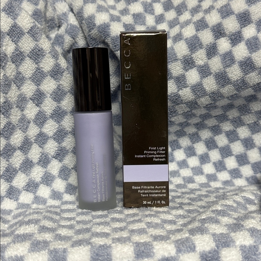 BECCA First Light Priming Filter -  1 oz bottle in original box. 
Never Used